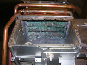 corroded evaporator coils in an HVAC unit